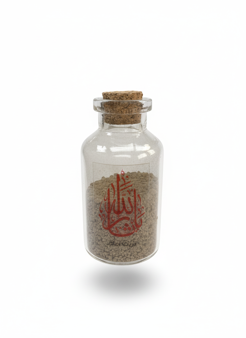 Glasflasche mit Erde aus Karbala